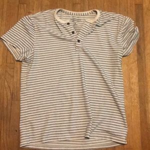 Blue and white crew neck shirt.